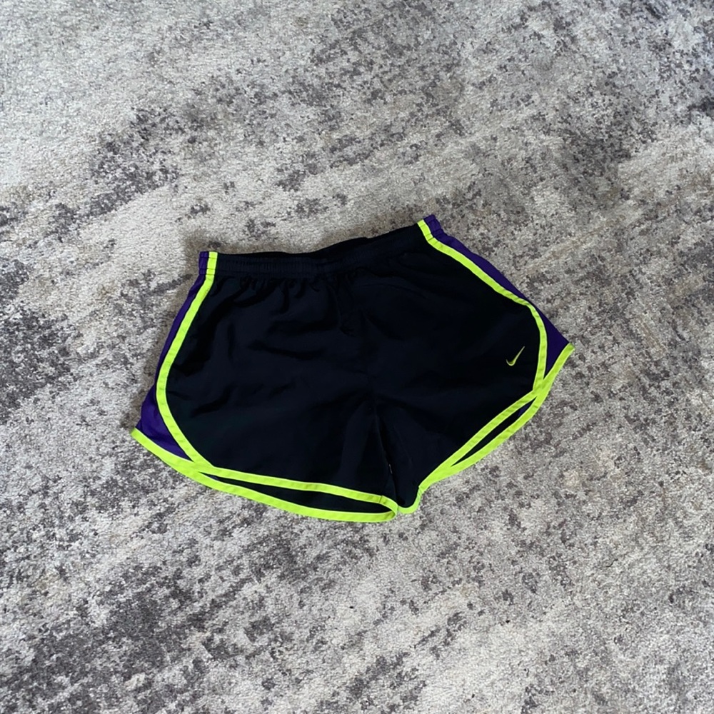 Black and purple, green Nike shorts